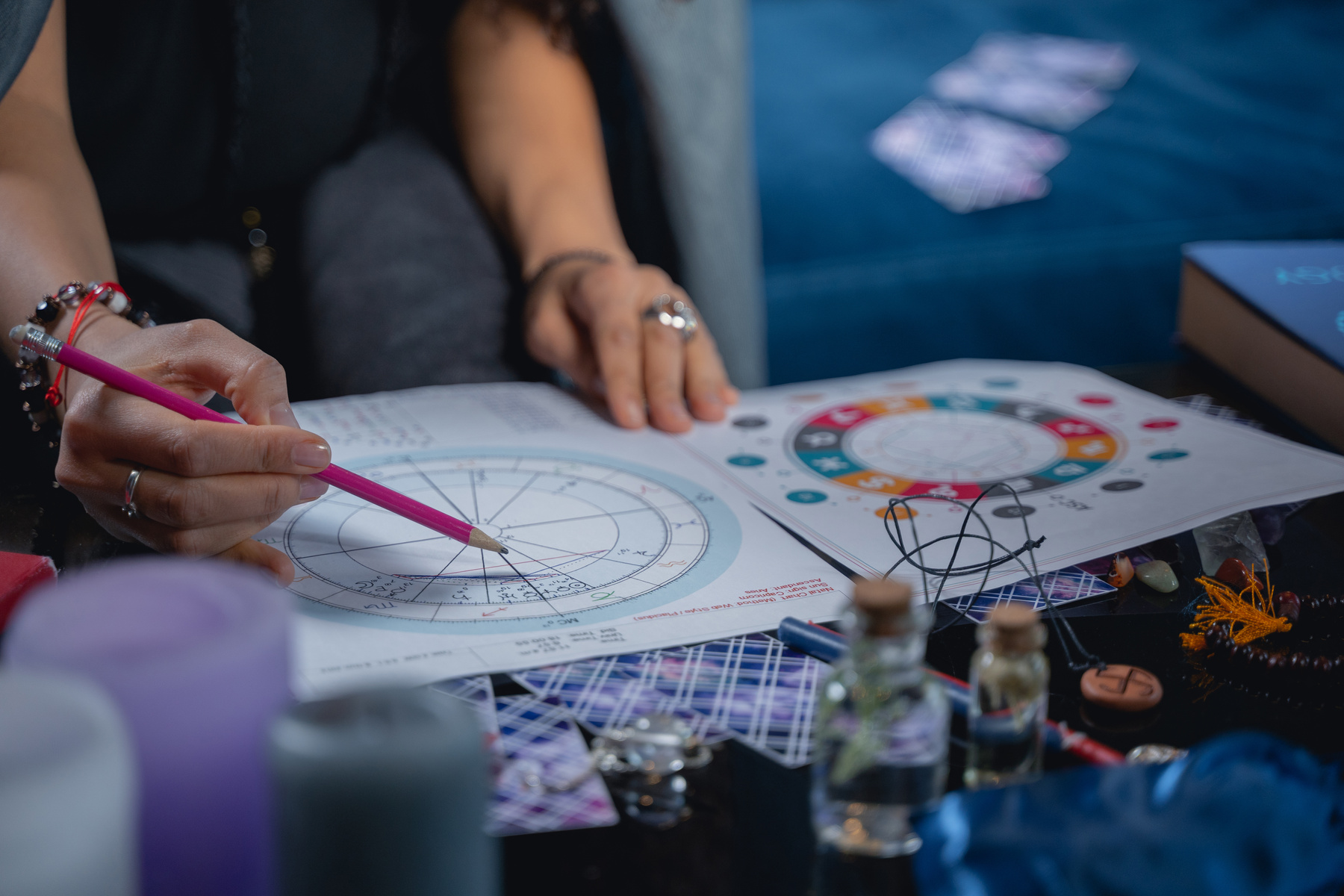 Female astrologer calculating her clients rising sign